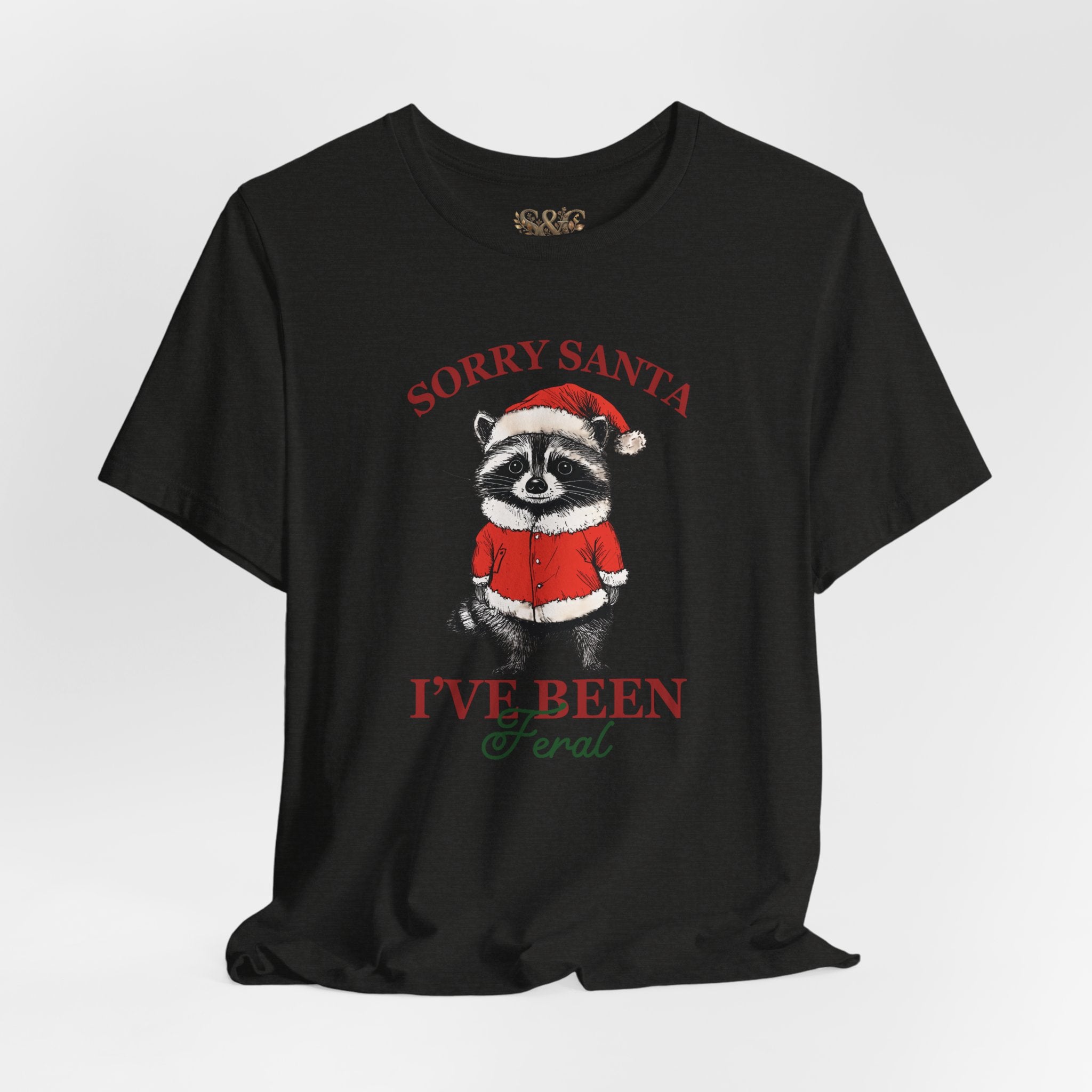 T‑Shirt — "Sorry Santa I've Been Feral" Raccoon Christmas Tee